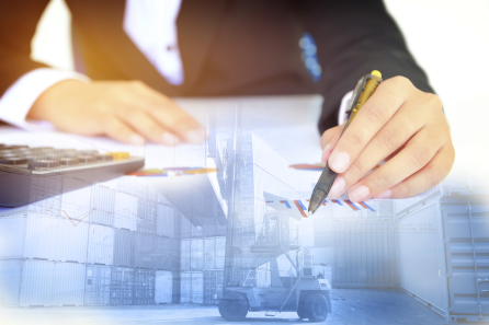Person in a suit writing with a pen, calculator nearby, reflecting on property line disputes. Overlaid with an image of shipping containers and a forklift, capturing the essence of navigating complex boundaries in business logistics.